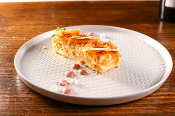 cake plate on black wood background 