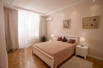 Naklejka na ściany i meble epmty minimalistic interior background, bedroom of modern apartment with big mirrors, double bed, lights on