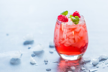 Fresh red drink with raspberries and crushed ice