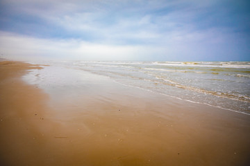 Fototapeta na wymiar Sandy beaches of Rimini in winter, Italy