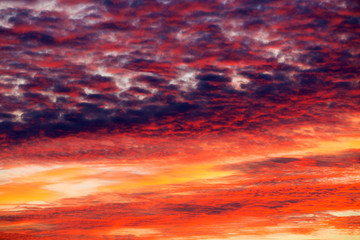 Colorful sunset sky over tranquil sea surface
