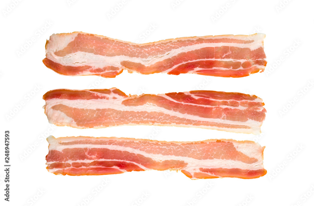 Wall mural A slice of bacon on a white background. Three raw bacon close up on a white background.