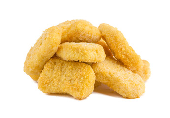 Frozen nuggets on a white background. Several chicken nuggets in breading close-up on a white background.