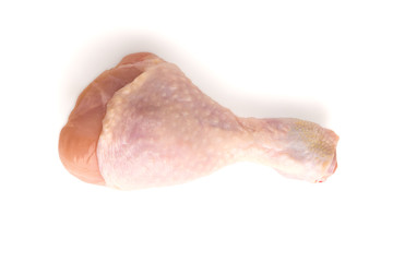 Raw chicken leg close-up. Raw chicken leg isolated on white background.