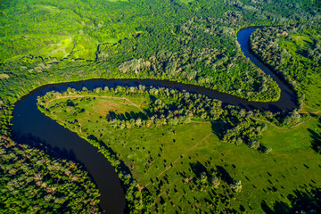 river flowing in the beautiful valley. Aerial view landscape. shooting from a drone. Summer time