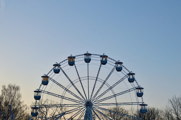 Ferris wheel in the park on a sunny winter day