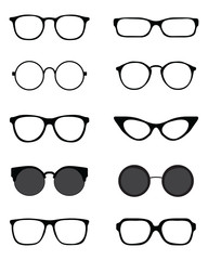Black silhouettes of different eyeglasses on a white background