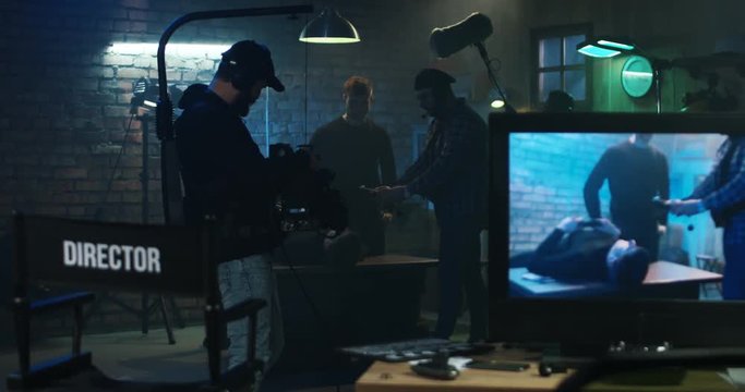 Director using his light meter on a film set