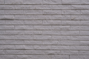 Old white brick stones wall background.Littered brick wall. Bricks wall. White brick wall.