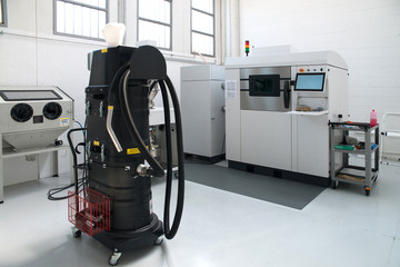 Metal 3D printer (DMLS) - Direct metal laser sintering (DMLS) is an additive manufacturing technique that uses a laser fired into a bed of powdered metal.