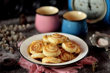 Delicious homemade puff pastry cookies with sugar and cinnamon.
