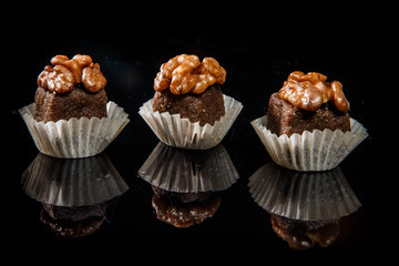 three healthy useful organic handmade candies with walnuts