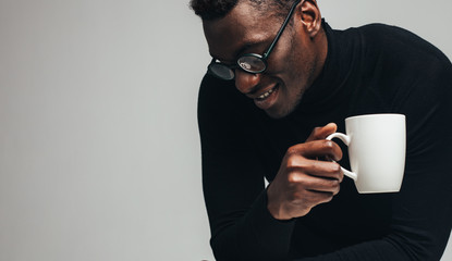 Man relaxing with a coffee