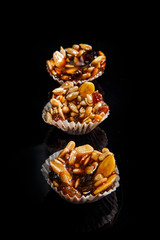 row of three of useful handmade candies with caramelized sunflower and pumpkin seeds