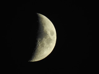 Naklejka premium Moon crescent on black sky