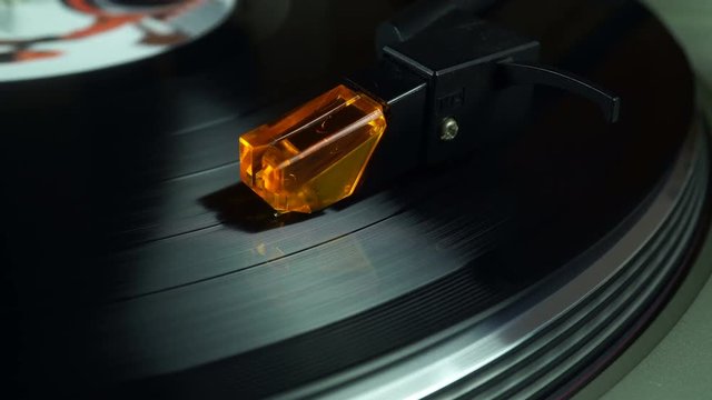 Listening to Music With Vinyl Records.