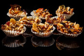 big group of useful handmade candies with caramelized sunflower and pumpkin seeds