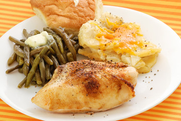 Skinless Chicken Breast Baked and Served with Buttered Green Beans and Potatoes Au Gratin