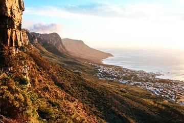 Deurstickers Stunning view of the dramatic landscape of the 12 apostles at sunset, seen from Kloof Corner lookout point on Table Mountain in Cape Town, South Africa © Anna