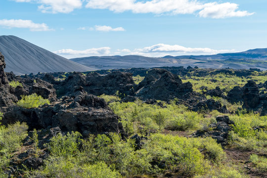 Dimmuborgir lava field, Myvatn area - Iceland. The Dimmuborgir area is composed of various volcanic caves and rock formations, reminiscent of an ancient collapsed citadel.