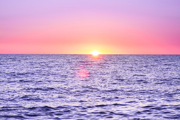 purple landscape with sea and sunset
