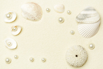White beach sand, shells and pearls