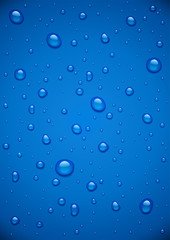 Water drop at blue background.