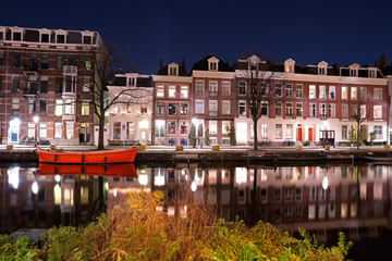 AMSTERDAM, NETHERLANDS - DECEMBER 12, 2018: Ruysdaelkade, new parking-free neighborhood in Amsterdam at night