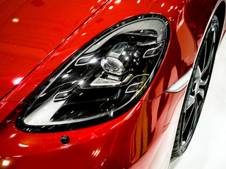 Right headlight. Car detail. Car's light. The front lights of the car.