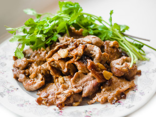 Pork stir fried garlic and soy source serve with fresh coriander. Thai food., Thai food, delicious Thai-cuisine.