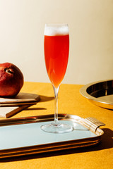 Tintoretto, an italian cocktail with 2/3 Prosecco (or Champagne) and 1/3 pomegranate juice, served in a flute. Pop contemporary style