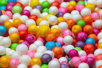 Fototapeta na wymiar Colorful bright background, multi-colored balls. Sweet nice background candy. 