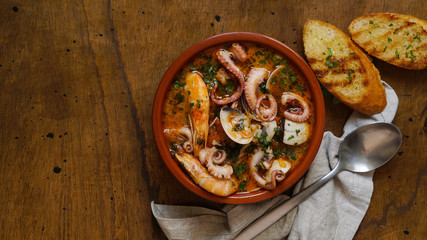 Caldereta (Spanish seafood stew), traditional northern Spanish seafood meal - obrazy, fototapety, plakaty