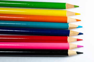 Fototapeta premium Colored sharpener pencils. Macro shot of many color pencils. 