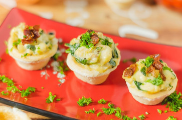 tart stuffed with chicken breast, parmesan cheese and spinach