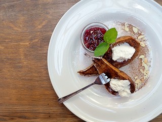 Dessert menu, Grilled pear with cinnamon drizzle, white cheese and mint, raspberry jam.