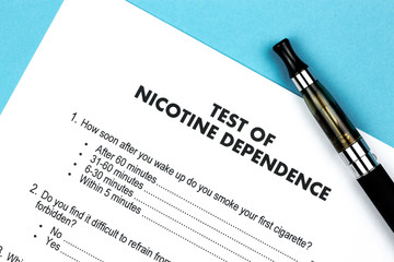 Obraz premium Test of Nicotine Dependence with e-cigarette