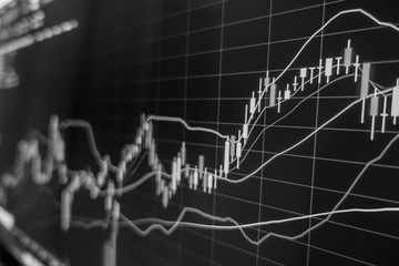 Stock exchange market in black and white on LED screen. Finance and economic concept.