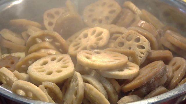 Bael fruit boiling in sirup. Dessert made of Boiled Bael fruit in syrup