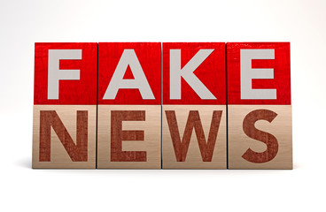 Wooden cube block on white background with word fake news. Concept. Junk news deliberate disinformation or hoaxes spread via traditional print, broadcast news media, online social media. 3d rendering