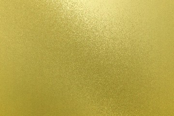 Reflection on rough yellow wall surfaces, abstract background