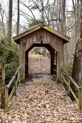 covered bridge walkway footbridge through the woods