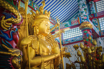 Golden statue of Guan Yin with 1000 hands. Guanyin or Guan Yin is an East Asian bodhisattva associated with compassion as venerated by Mahayana Buddhists and known as the "Goddess of Mercy" in English