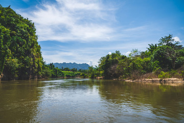 Fototapeta na wymiar blue sky river lake mountain wildlife Kanchanaburi Thailand