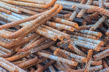 Rusty deformed bars for reinforcement concrete background. Rusty Re-bar steel or deformed bar material for building construction.