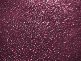 beautiful texture emboss blurred background of close up foam sheet in dark pink color, plastic foam sheet background dark red color, focus and blurred texture background dark pink color