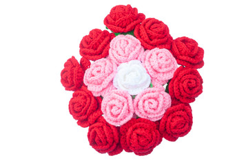 Crochet roses with yarn for giving to those we love, Valentine's day isolated on white background, Top view.