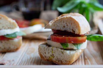sandwich with tomato, basil and mozzarella