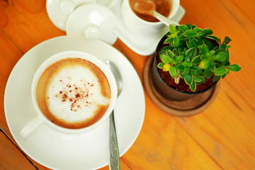 cup of coffee on the wooden
