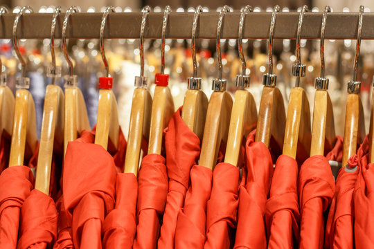 Red Spring Windbreakers On Hangers In The Store